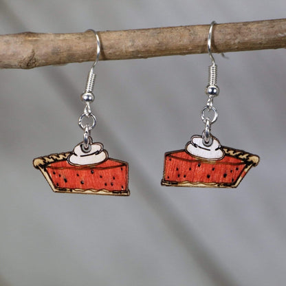 Hand-painted wooden pumpkin pie dangle earrings with classic Thanksgiving dessert design and hypoallergenic sterling silver hooks, lightweight fall statement jewelry earrings for holiday gatherings and cozy autumn style