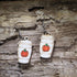 Pumpkin spice latte wooden dangle earrings featuring a hand-painted fall coffee cup with festive pumpkin details. Lightweight autumn earrings with hypoallergenic .925 sterling silver hooks, perfect for coffee lovers, pumpkin spice fans, baristas, fall festivals, cozy seasonal outfits, and autumn jewelry gifts.