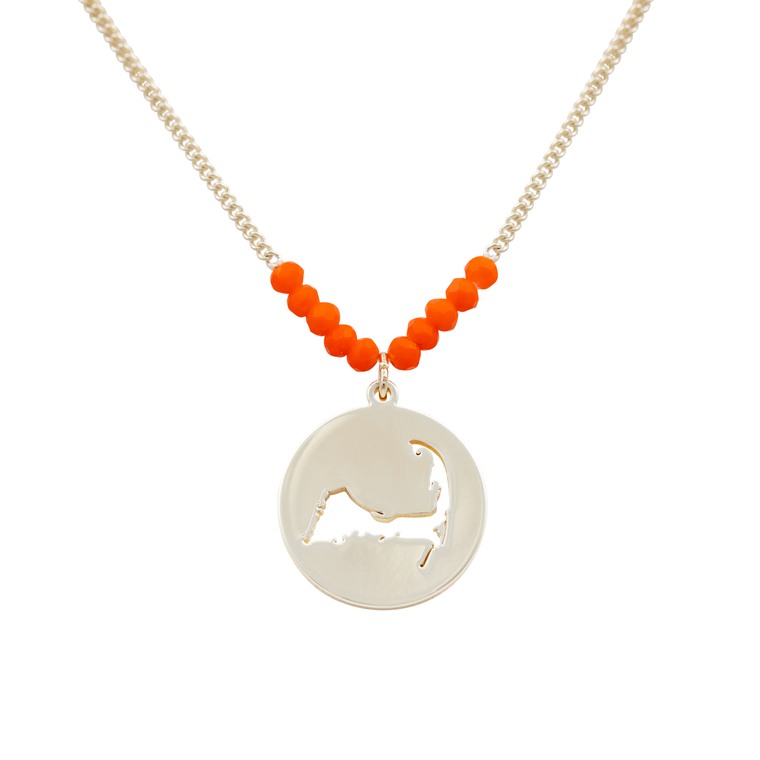 the beach and back cape cod necklace in gold with coral beads at center of chain and coin shape pendant with cutout silhouette of cape cod