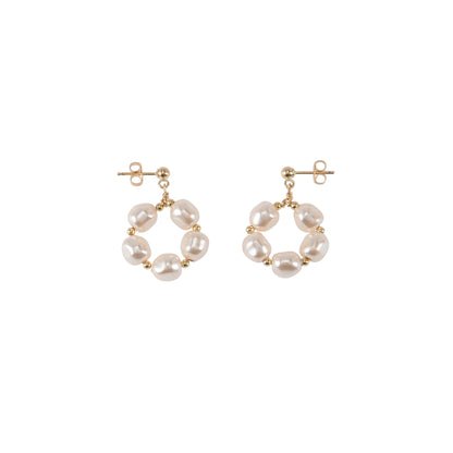 Handmade Maasai beadwork gold and Swarovski pearl circle earrings by Sidai Designs, ethical artisan jewelry brand, Tanzania