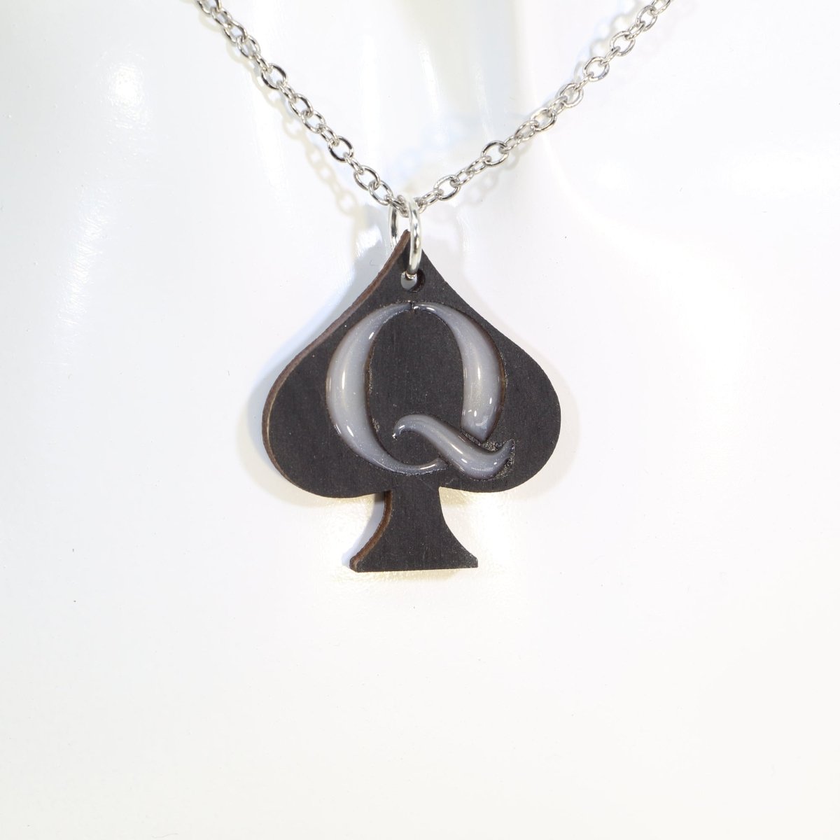 Hand-painted wooden Queen of Spades d with bold card suit design and hypoallergenic sterling silver hooks, lightweight playing card statement jewelry earrings for poker fans and confident edgy stylenecklace