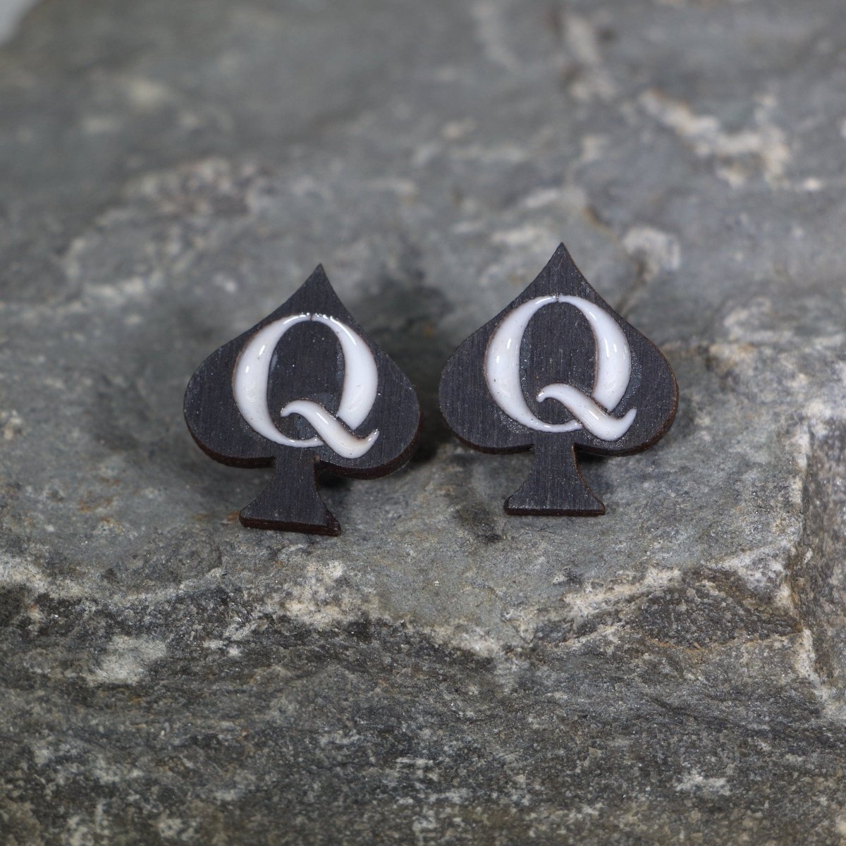 Hand-painted wooden Queen of Spades stud earrings with bold card suit design and hypoallergenic sterling silver hooks, lightweight playing card statement jewelry earrings for poker fans and confident edgy style