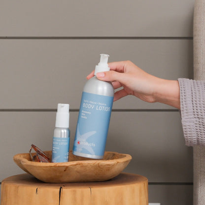 A full size natural body lotion and travel size toxin-free body lotion that can be refilled after a trip reducing plastic waste. 