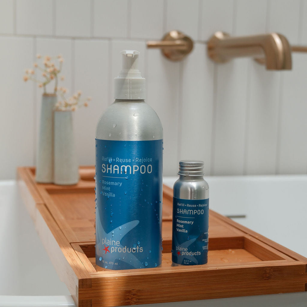 16oz of rosemary mint vanilla shampoo with a travel size that can be refilled at home without plastic waste in a square photo
