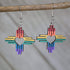 Hand-painted wooden rainbow Zia heart dangle earrings with New Mexico sun symbol design and hypoallergenic sterling silver hooks, lightweight pride statement jewelry earrings for NM style and LGBTQ expression