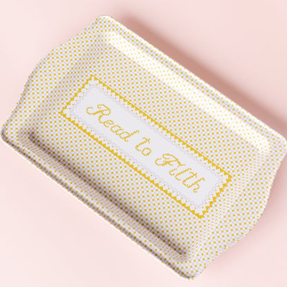 Read To Filth trinket tray styled with jewelry and bookish accessories on ceramic display, Jollity &amp; Co.