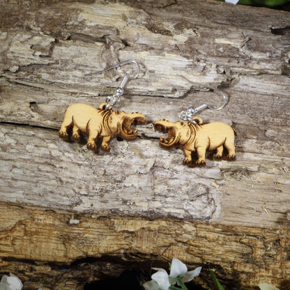 Hand-painted wooden hippopotamus dangle earrings featuring realistic hippo artwork with open mouths, hypoallergenic sterling silver hooks, and lightweight wildlife animal jewelry for zoo lovers, safari enthusiasts, and hippo fans by Cate&