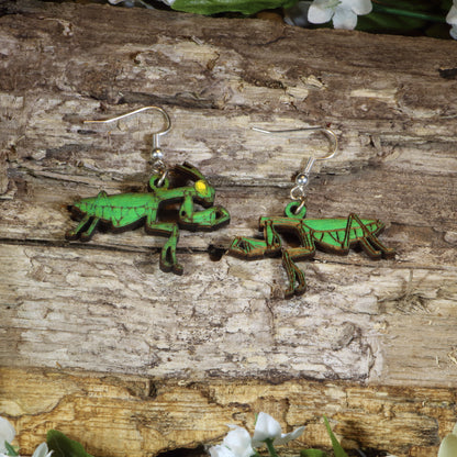 Hand-painted wooden praying mantis dangle earrings featuring realistic green mantis artwork, hypoallergenic sterling silver hooks, and lightweight insect jewelry for bug lovers, entomologists, and nature enthusiasts by Cate&