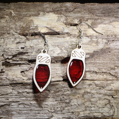 Handcrafted red resin Christmas light wooden dangle earrings featuring colorful holiday light bulbs with glossy resin-filled centers. Lightweight laser-cut wooden earrings with hypoallergenic .925 sterling silver hooks, perfect for Christmas celebrations, holiday parties, festive fashion, Christmas light lovers, and seasonal handmade jewelry.
