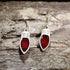 Handcrafted red resin Christmas light wooden dangle earrings featuring colorful holiday light bulbs with glossy resin-filled centers. Lightweight laser-cut wooden earrings with hypoallergenic .925 sterling silver hooks, perfect for Christmas celebrations, holiday parties, festive fashion, Christmas light lovers, and seasonal handmade jewelry.