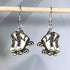 Hand-painted wooden roller derby skate dangle earrings featuring a retro quad skate design with wheels and lace details and hypoallergenic sterling silver hooks, lightweight jewelry for skaters and roller derby enthusiasts by Cate’s Concepts
