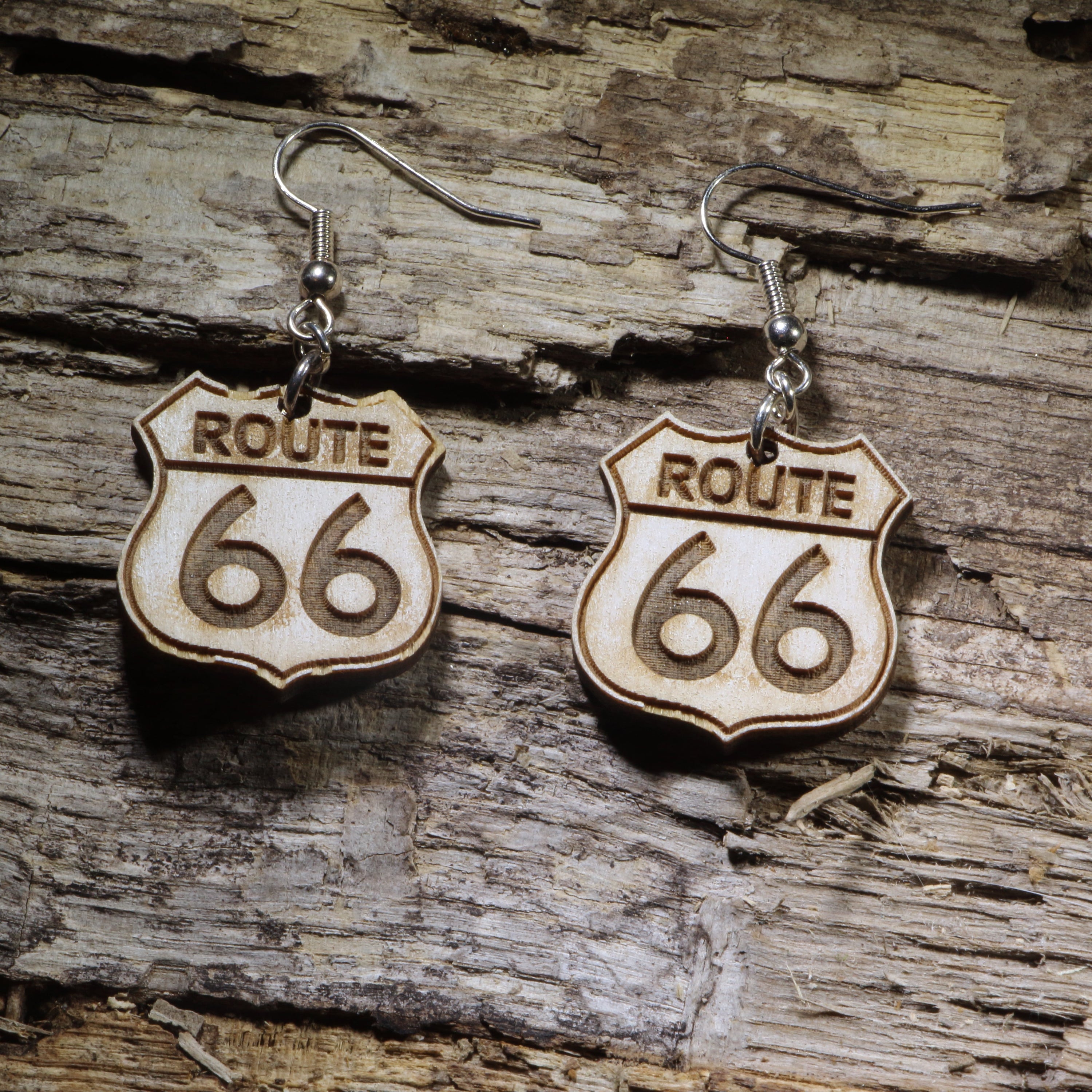 Hand-painted Route 66 wooden dangle earrings on hypoallergenic .925 sterling silver hooks. Lightweight road trip travel jewelry for Route 66 enthusiasts, travelers, vintage Americana fans, and adventure seekers.