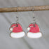 Hand-painted wooden Santa hat dangle earrings with festive Christmas holiday design and hypoallergenic sterling silver hooks, lightweight Santa hat statement jewelry earrings for holiday parties and seasonal style