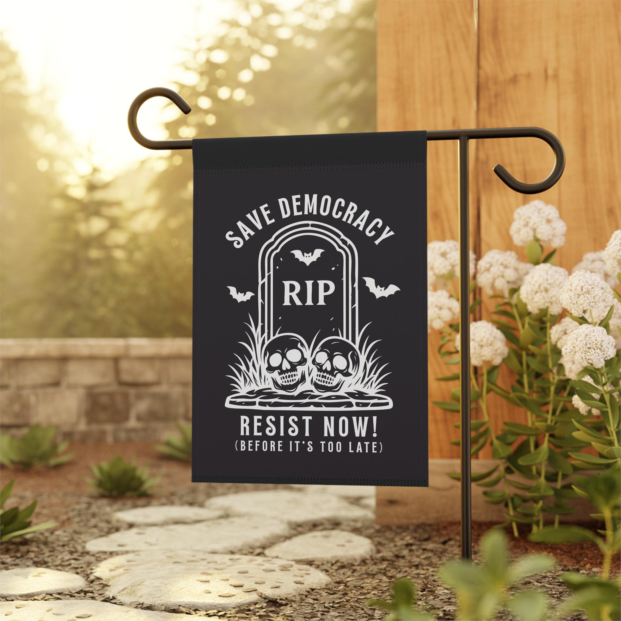 Halloween protest flag with tombstone, skulls, bats, and text “Save Democracy — Resist Now (Before It’s Too Late).”