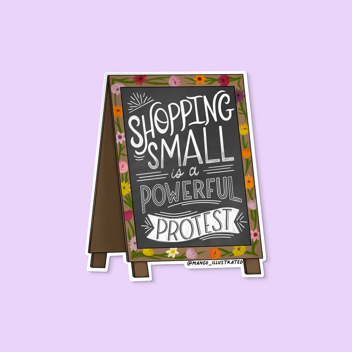 Shopping Small is a Protest Sticker flat lay — shop small activist waterproof vinyl sticker by indie artist MangoIllustrated