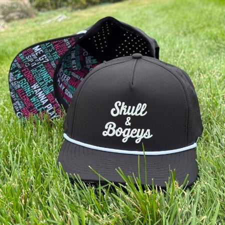 A black snapback cap with white embroidered text reading &