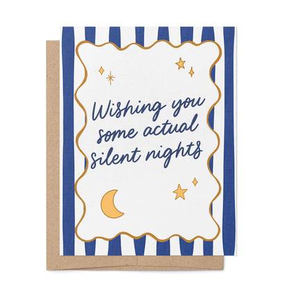 Silent Nights Holiday Card flat lay — retro navy stripe illustrated holiday card by indie artist MangoIllustrated