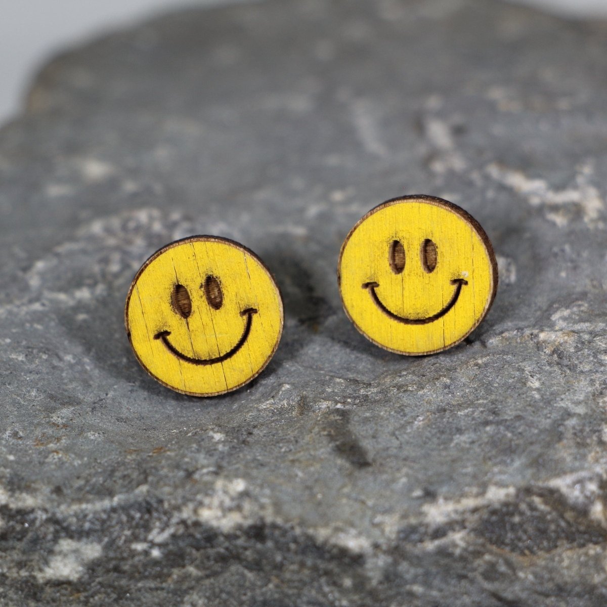 Hand-painted wooden smiley face dangle earrings with retro happy face design and hypoallergenic sterling silver hooks, fun nostalgic statement jewelry for playful style lovers