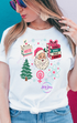 Social justice Christmas graphic T-shirt with voting, banned books, women’s rights, Santa and public lands symbols