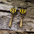 Hand-painted wooden softball and bat dangle earrings on hypoallergenic .925 sterling silver hooks. Lightweight softball jewelry for players, coaches, team moms, tournament weekends, game days, and sports fans.