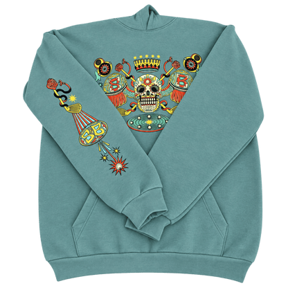 An Arctic  Blue Skull &amp; Bogeys Golf Co. crewneck sweatshirt with a large, colorful graphic print on the chest and left sleeve. The graphic features a central skull surrounded by crossed swords, a crown, and a hot air balloon with stars and a snake.
