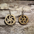 Handcrafted steampunk gear wooden dangle earrings featuring intricate interlocking gears inspired by Victorian industrial design. Lightweight laser-cut wooden earrings with hypoallergenic .925 sterling silver hooks, perfect for steampunk enthusiasts, engineers, makers, cosplay, science fiction fans, and vintage-inspired statement jewelry.