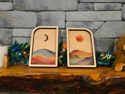 Sun and moon wood wall art set displayed on a stone mantle, layered Baltic birch panels handmade in Ohio