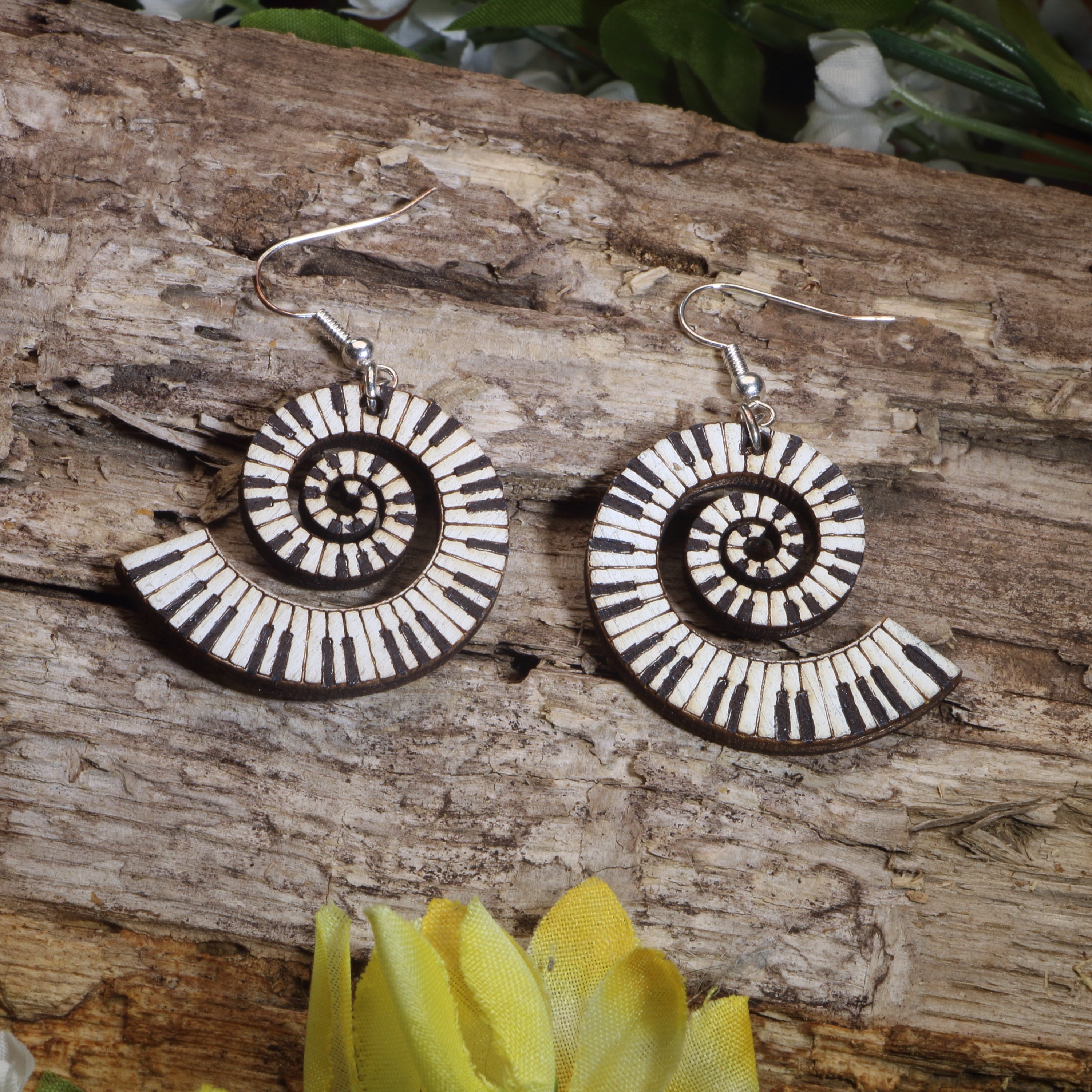 Hand-painted wooden swirl piano keyboard dangle earrings with artistic spiral piano key design and hypoallergenic sterling silver hooks, lightweight music jewelry for pianists, music teachers, and keyboard lovers by Cate’s Concepts