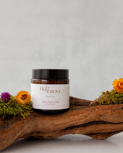 Regenerative suet tallow body cream infused with calendula &amp; dandelion and scented with essential oils a 4 oz amber glass jar