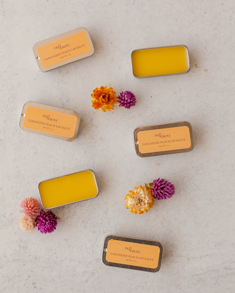 Fig &amp; Grove Tangerine Lip Salve in aluminum tin, natural beeswax lip balm with olive oil and mango butter.