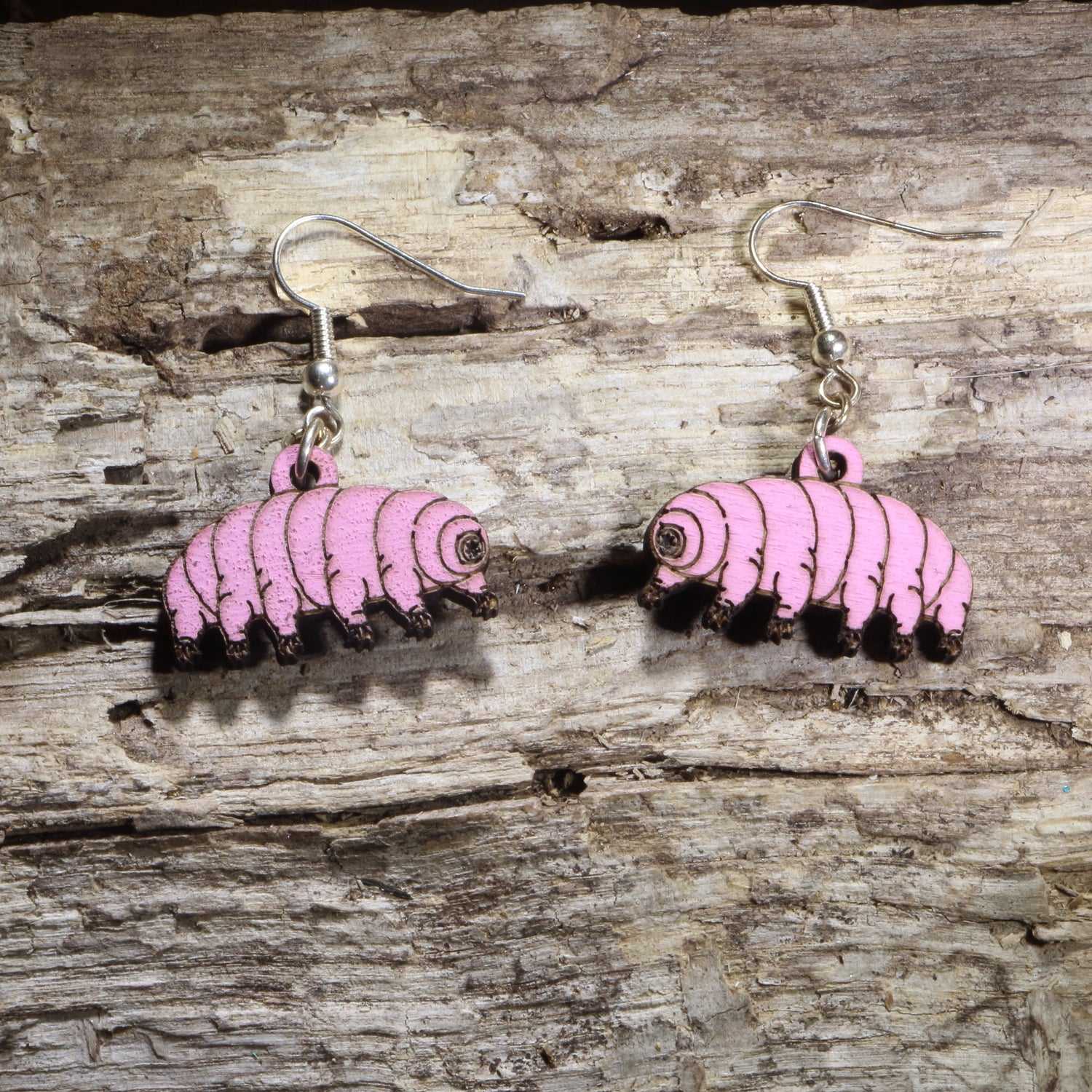 Handcrafted Tardigrade wooden dangle earrings featuring the microscopic water bear with detailed hand-painted accents. Lightweight laser-cut wooden earrings with hypoallergenic .925 sterling silver hooks, perfect for microbiologists, biology teachers, science lovers, microbiology students, STEM enthusiasts, and fans of unique scientific jewelry.