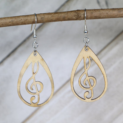 Hand-painted wooden teardrop treble clef dangle earrings featuring a graceful teardrop shape with a centered treble clef design and hypoallergenic sterling silver hooks, lightweight jewelry for musicians and music lovers by Cate’s Concepts