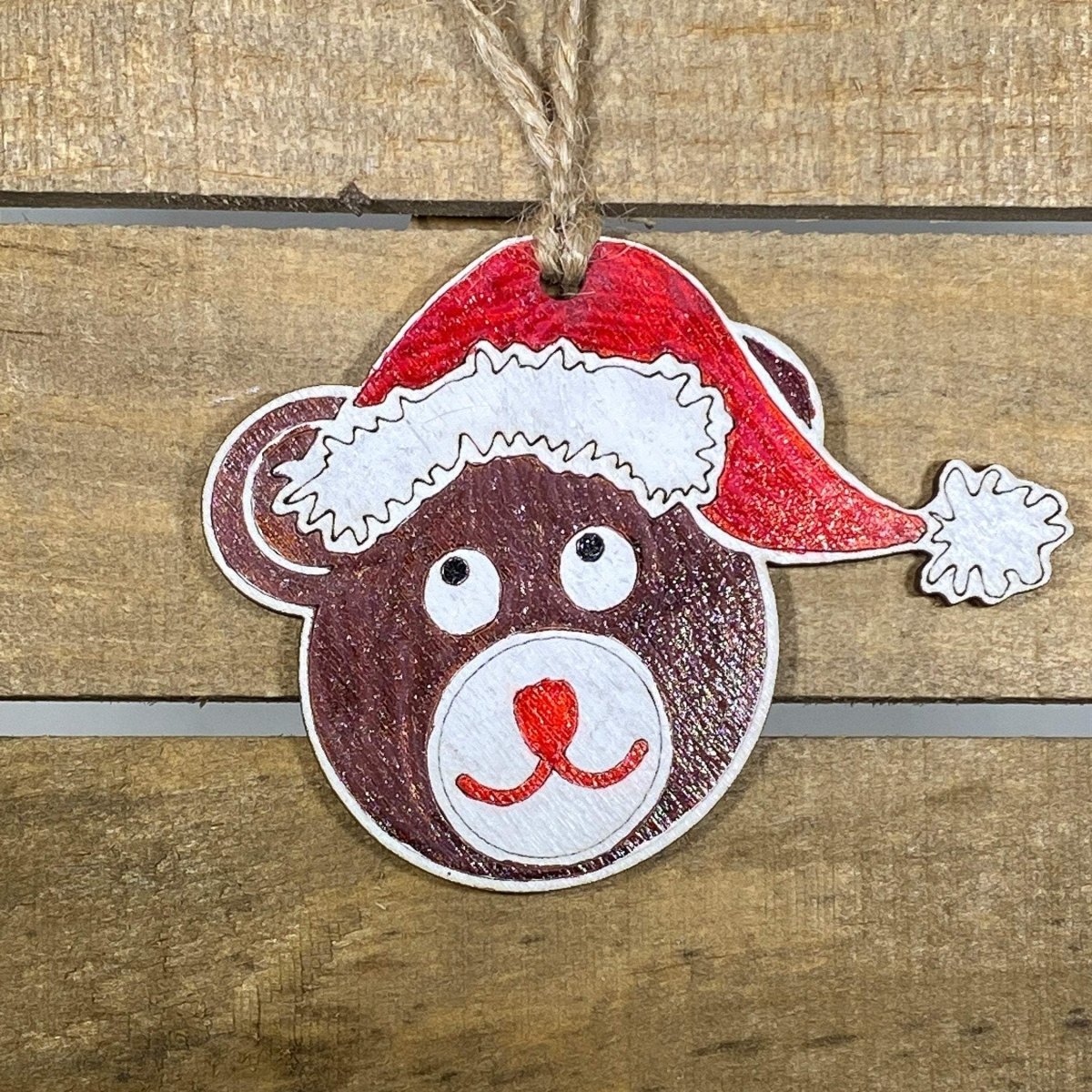 Hand-painted wooden teddy bear Christmas ornament featuring a cute cuddly bear design with soft rounded features and charming details, festive holiday decor for kids’ rooms and gift-giving by Cate’s Concepts