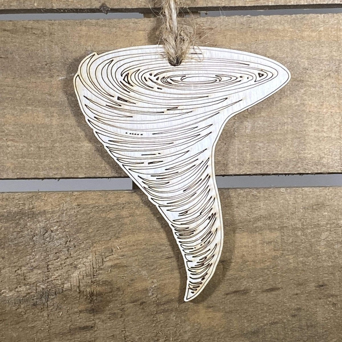 Hand-painted wooden tornado Christmas ornament featuring a swirling storm funnel design with dynamic motion lines and weather-inspired detailing, unique holiday decor for storm chasers and weather enthusiasts by Cate’s Concepts