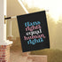 trans rights equal human rights house flag.  black background with modern retro font in light blue, pink and white.