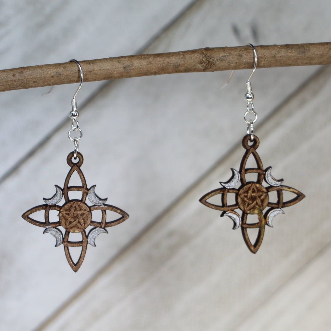 Hand-painted wooden triple moon pentacle dangle earrings with Wiccan pagan symbol design and hypoallergenic sterling silver hooks, lightweight spiritual jewelry for witchy style and mystical practice by Cate’s Concepts

