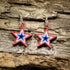 Hand-painted wooden patriotic star dangle earrings featuring layered red, white, and blue star design, hypoallergenic sterling silver hooks, and lightweight Americana jewelry for Fourth of July celebrations, veterans, and patriotic everyday style by Cate’s Concepts.