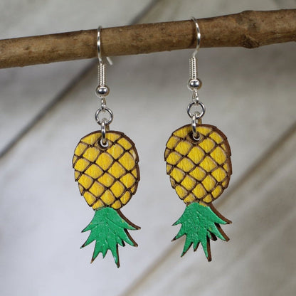 Hand-painted wooden upside down pineapple dangle earrings with playful tropical design and hypoallergenic sterling silver hooks, cheeky novelty statement jewelry for fun conversation starters