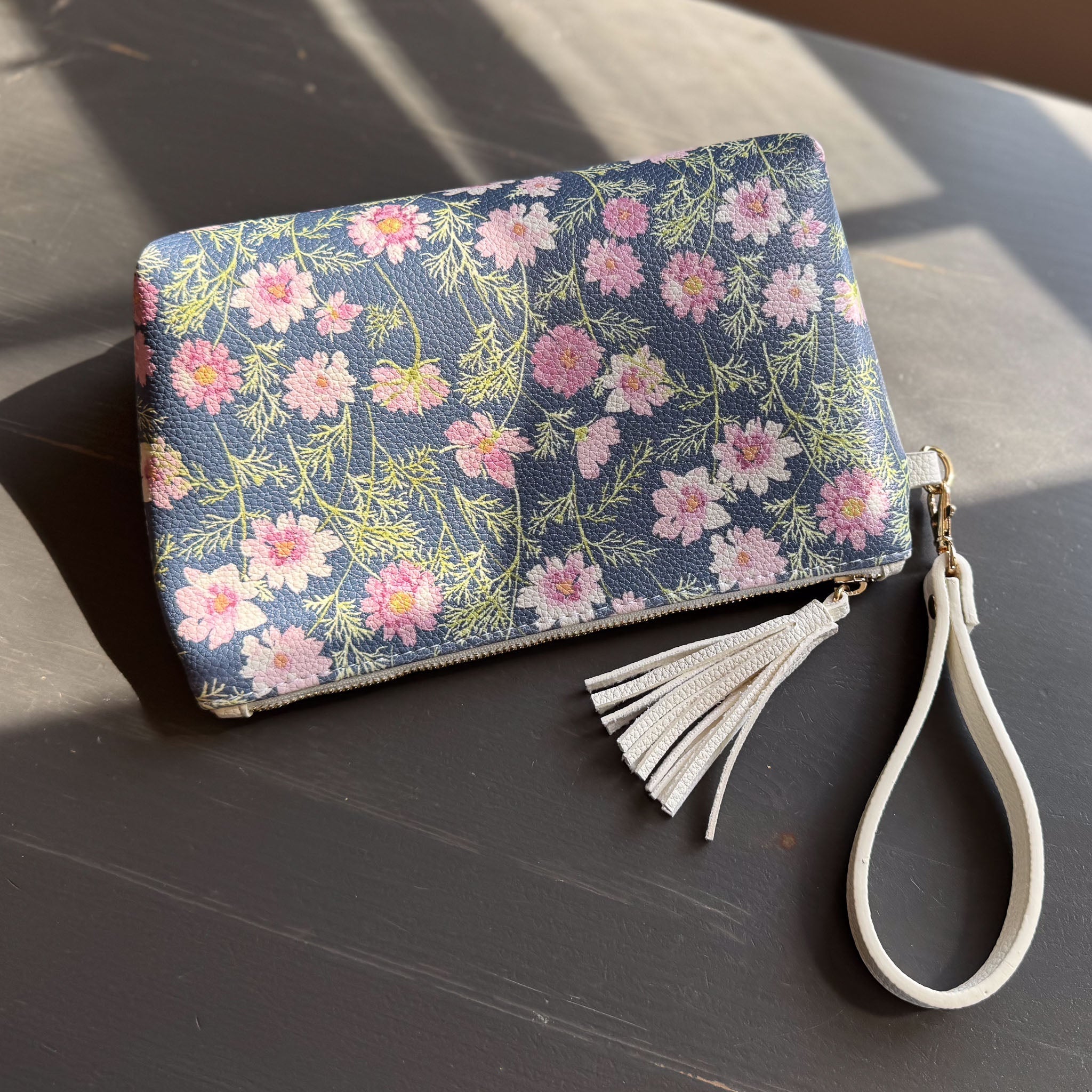airy cosmos clutch in vegan leather