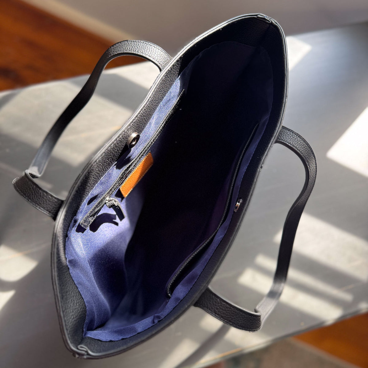 featherlight carryall in vegan leather