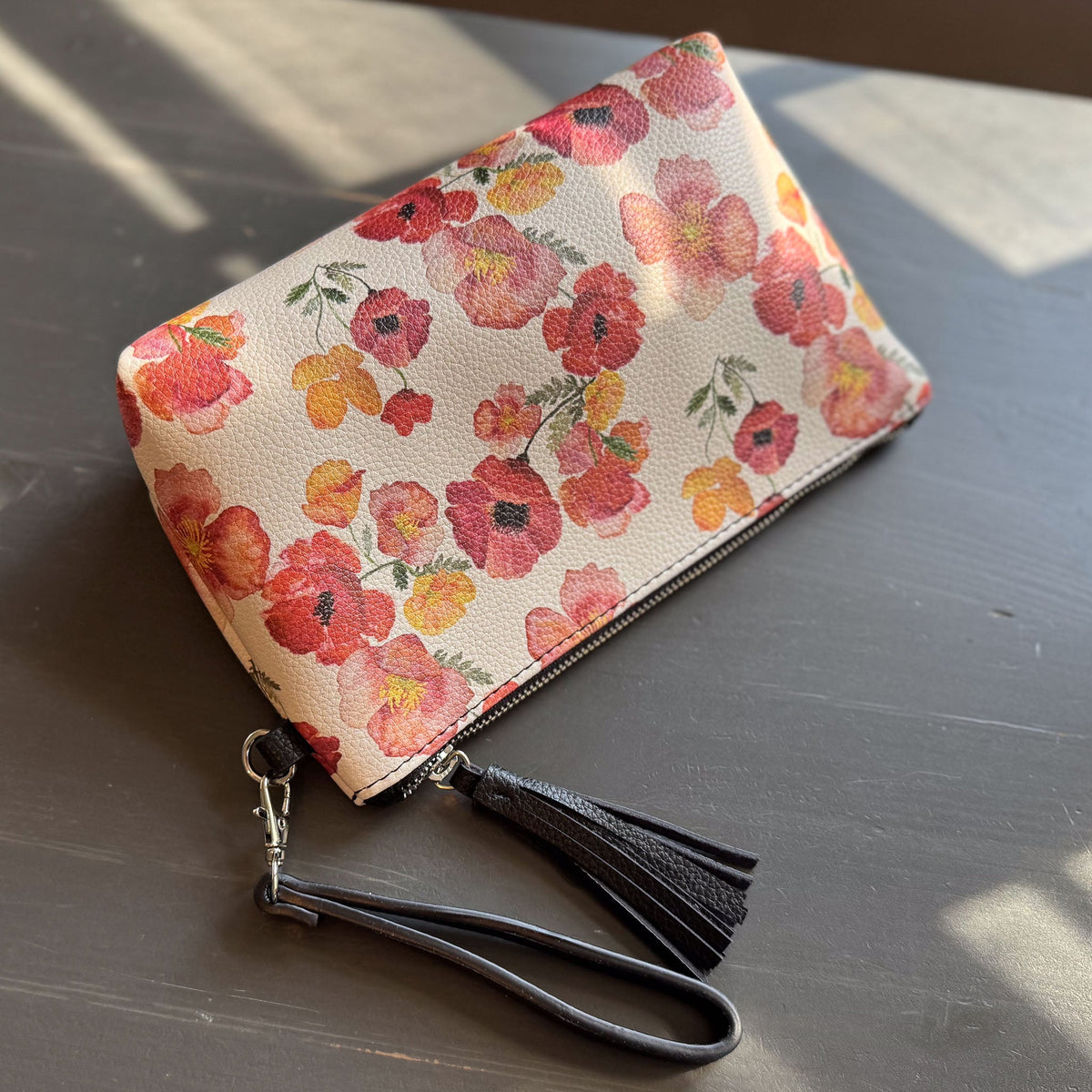 the ember poppies clutch collection in vegan leather