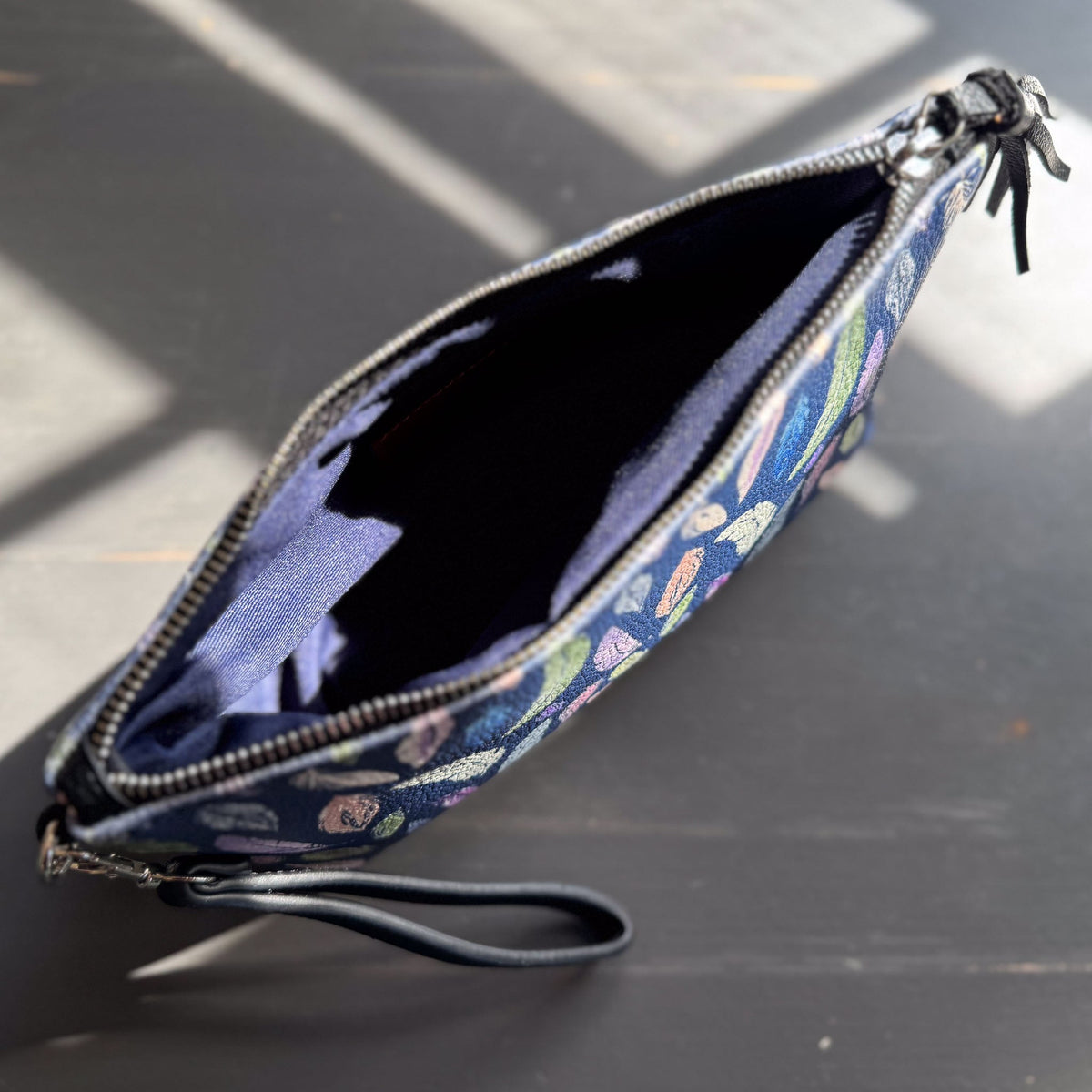 the featherlight clutch collection in vegan leather