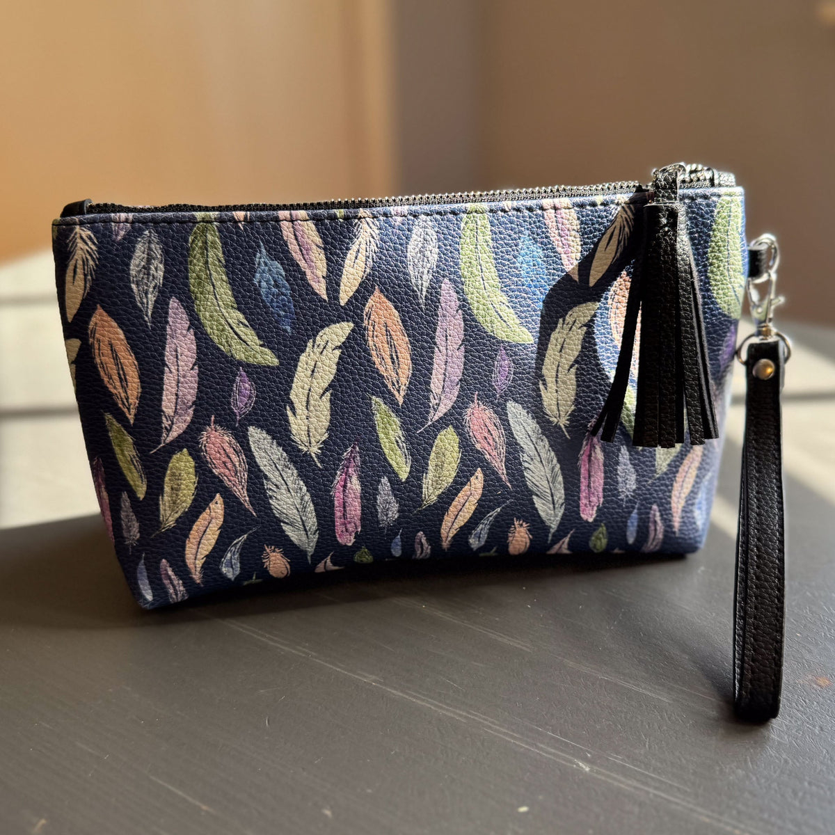 the featherlight clutch collection in vegan leather