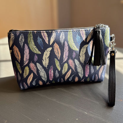 the featherlight clutch collection in vegan leather