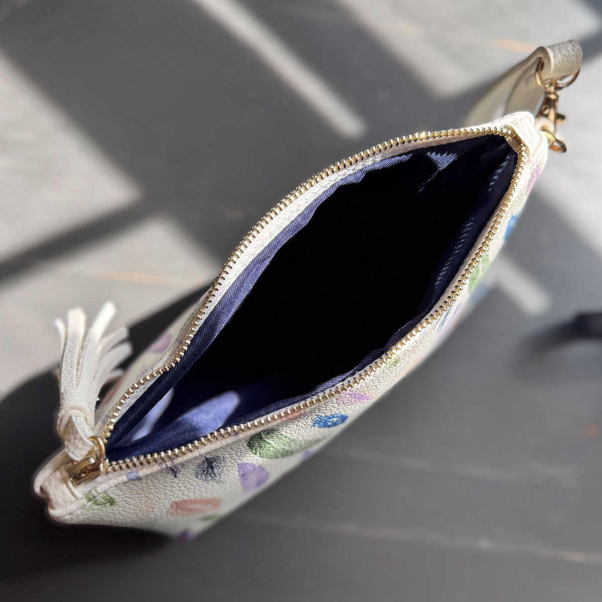the featherlight clutch collection in vegan leather