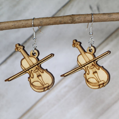 Hand-painted wooden violin dangle earrings featuring a detailed string instrument design with curved body and fine tuning details and hypoallergenic sterling silver hooks, lightweight jewelry for musicians and orchestra lovers by Cate’s Concepts