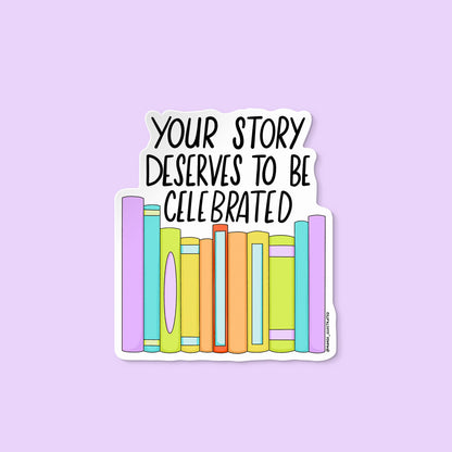 Your Story Deserves to Be Celebrated sticker flat lay — LGBTQ bookish pride vinyl sticker by MangoIllustrated