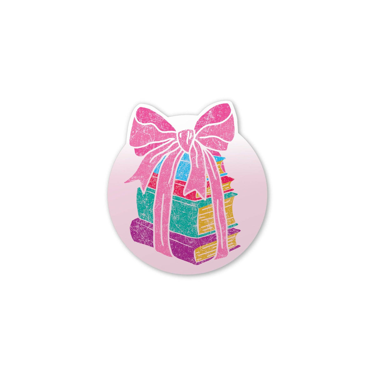 A circular sticker or decal featuring a pink bow tied around a stack of colorful books, shown on a plain white background.