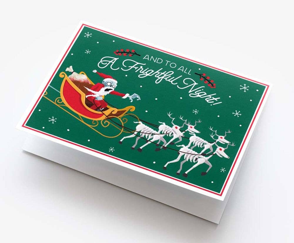 A Christmas greeting card or gift box featuring Santa Claus in a red sleigh being pulled by white reindeer on a dark green background with the text &