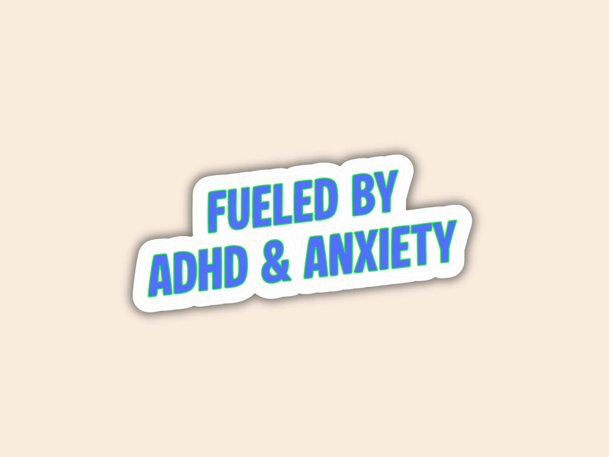 A die-cut sticker with the text &